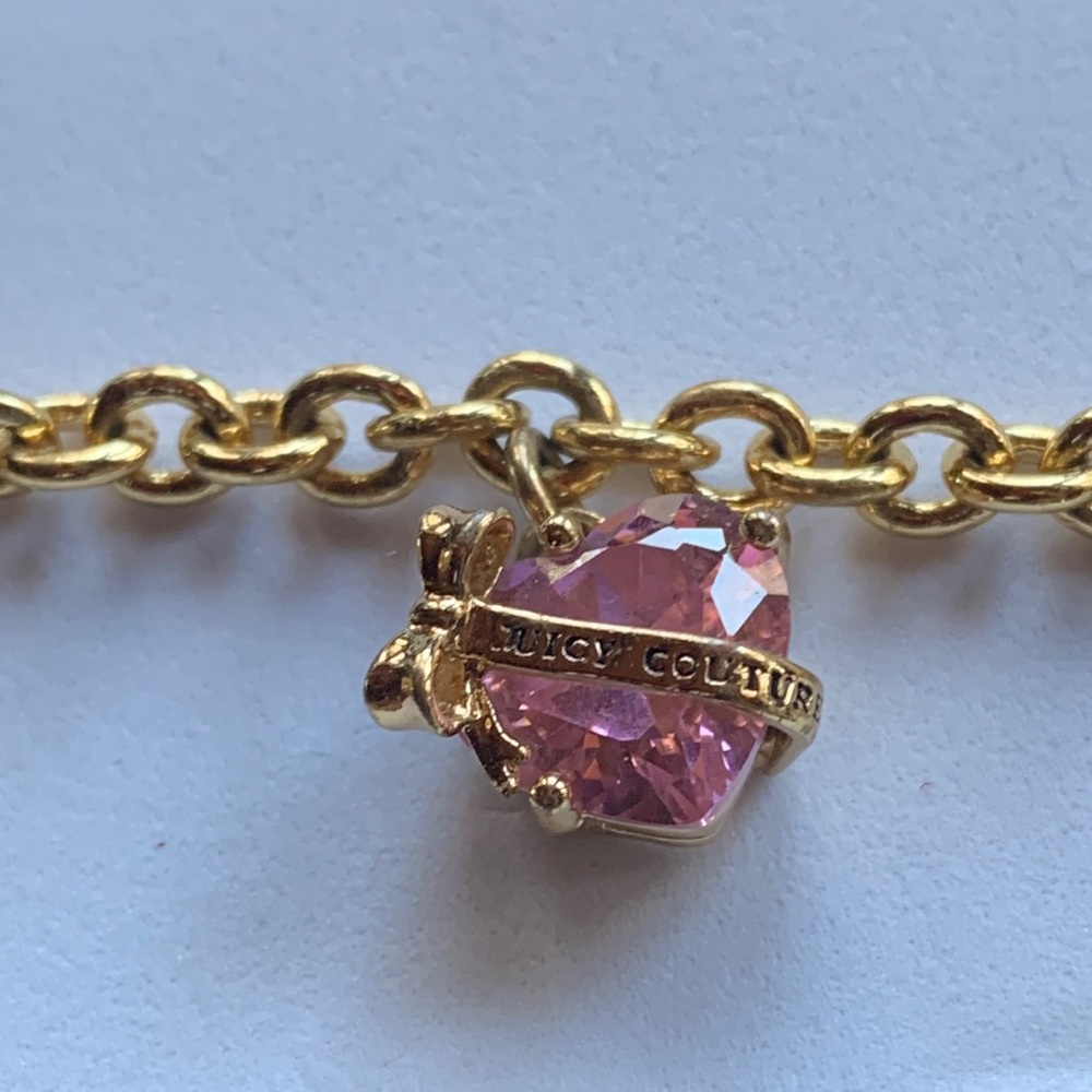 Juicy couture pink heart charm bracelet.